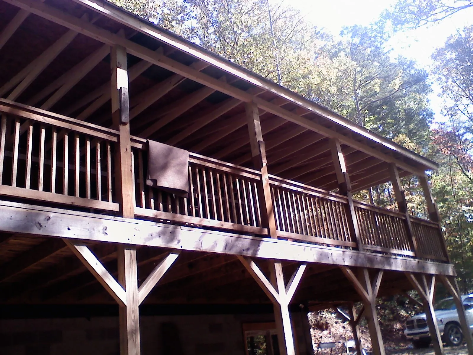 Timber framing under a new elevated porch and deck — Roof Leak Repair in Little River Academy by Roofing Brothers